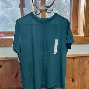 Women’s Crew Neck T-Shirts in Teal and Bright Pink and a Light Brown Tank Top